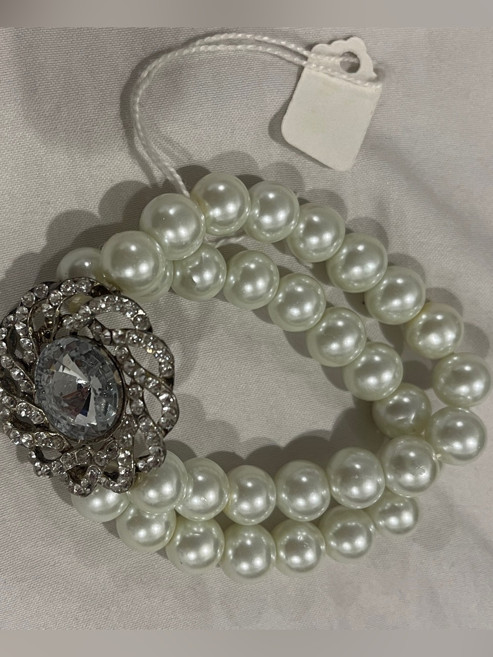Triple Strand White Pearl Bracelet with Crystal Flower Clasp